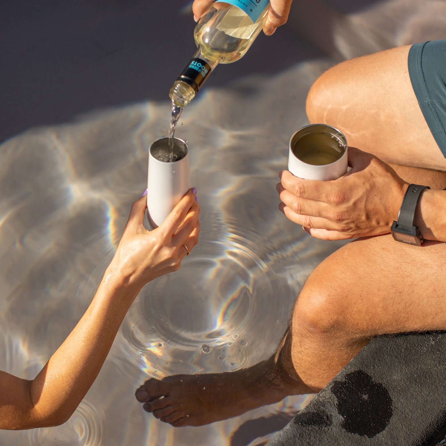 7oz White Celebration Tumbler held by a woman