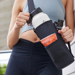 40oz Onyx Bottle Sling carried by a woman