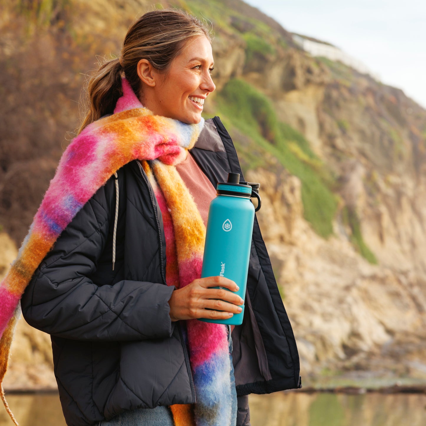 40oz Onyx/Splash Bottles with Spout Lids. Woman carrying splash bottle.